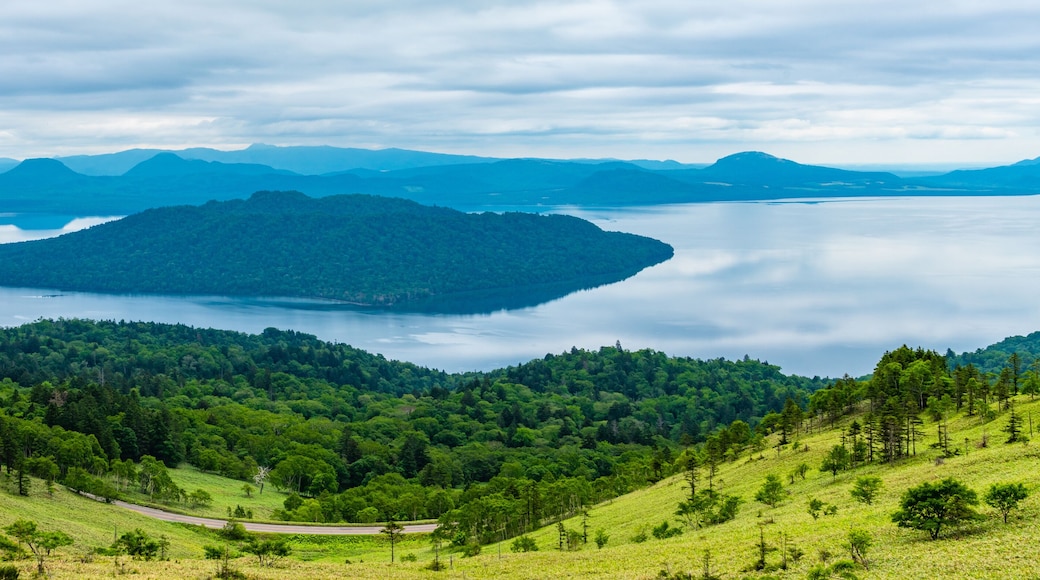 Lake Kussharo in summer season sunny day. Natural landscape from Bihoro-toge pass lookout view point. Akan Mashu National Park, Hokkaido, Japan