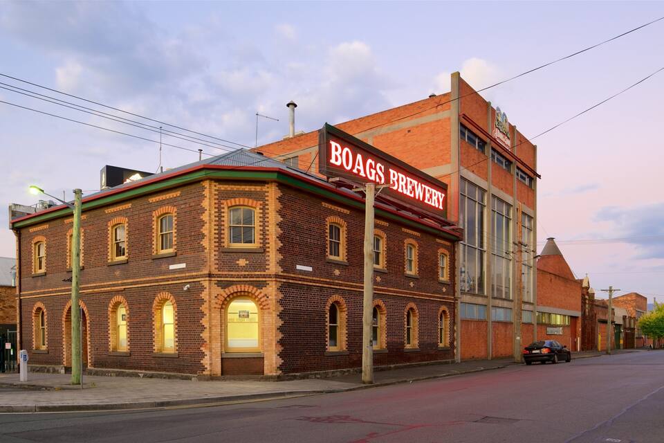 A historic brick building with a sign reading "BOAGS BREWERY."