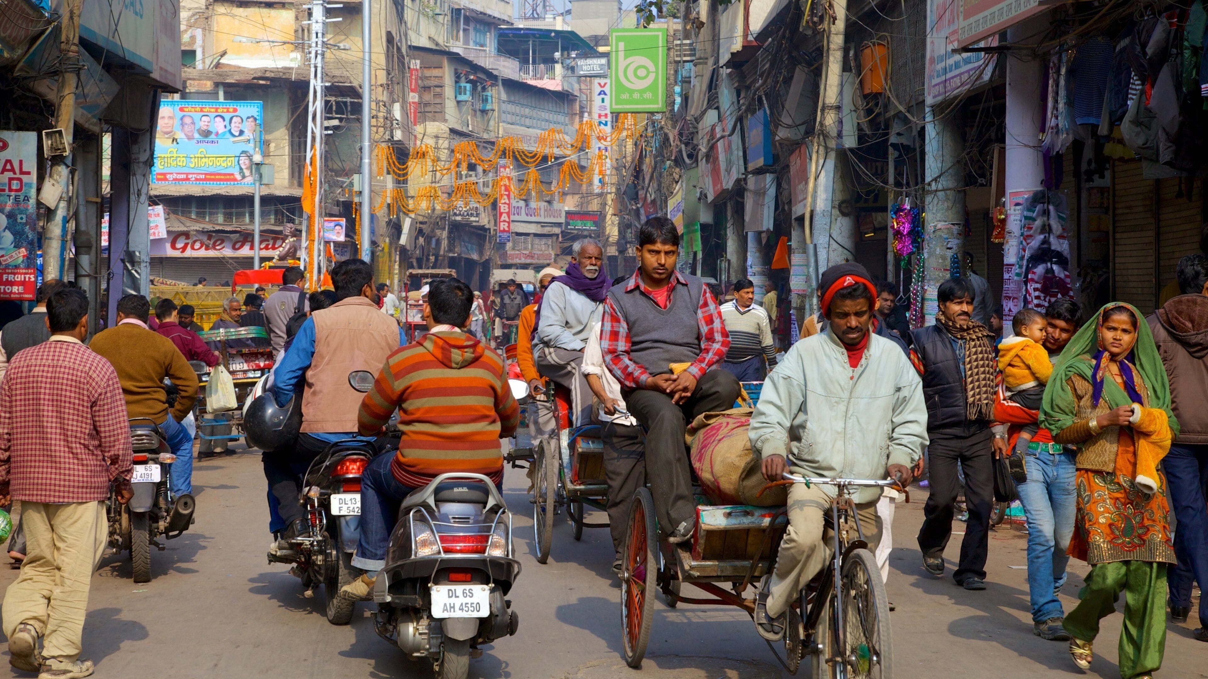 Chandni Chowk featuring street scenes, a city and motorcycle riding