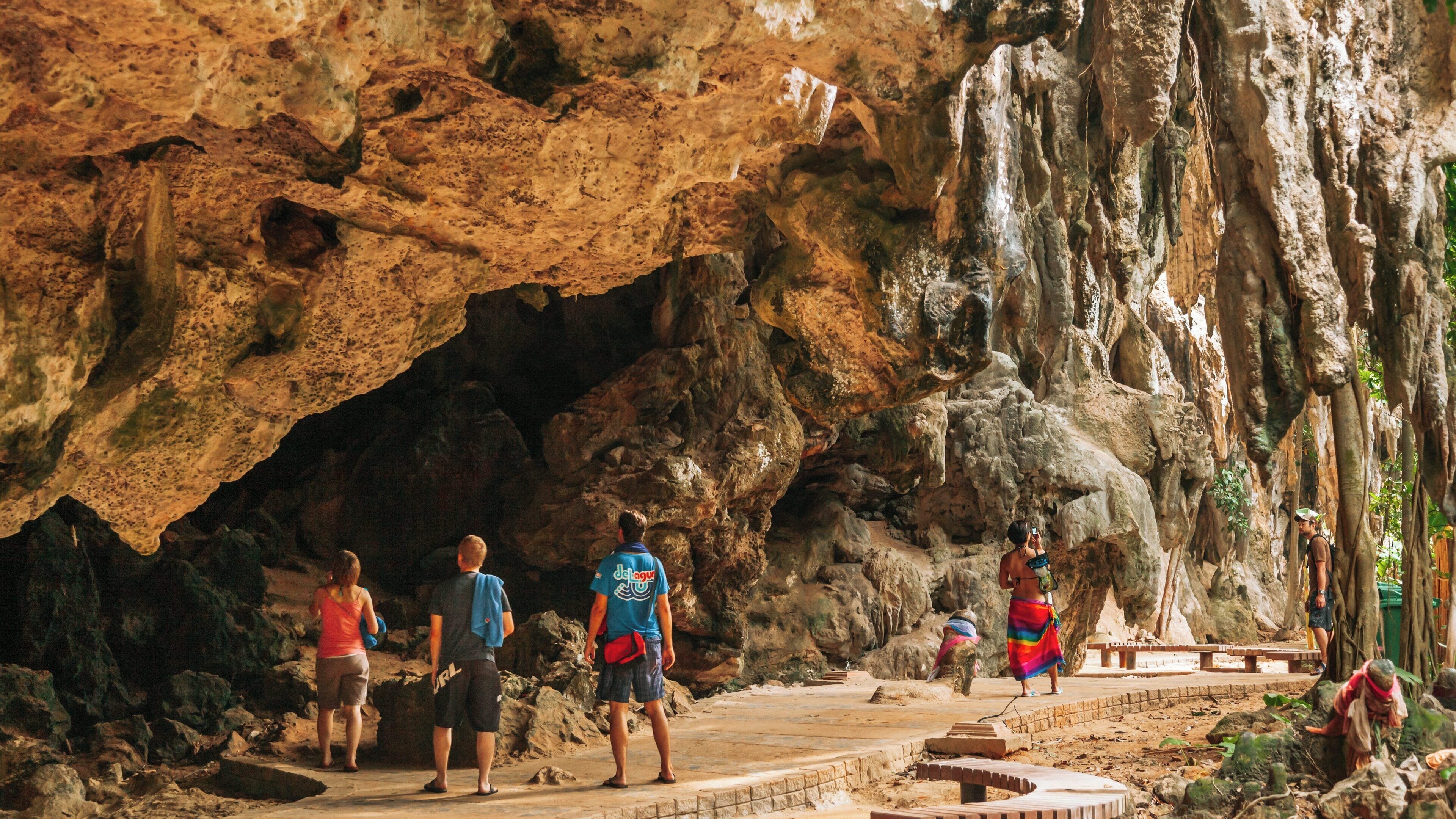 Exploring the Erawan Shrine in Pathumwan, Bangkok, Thailand with vibrant surroundings and intricate architecture captivating visitors