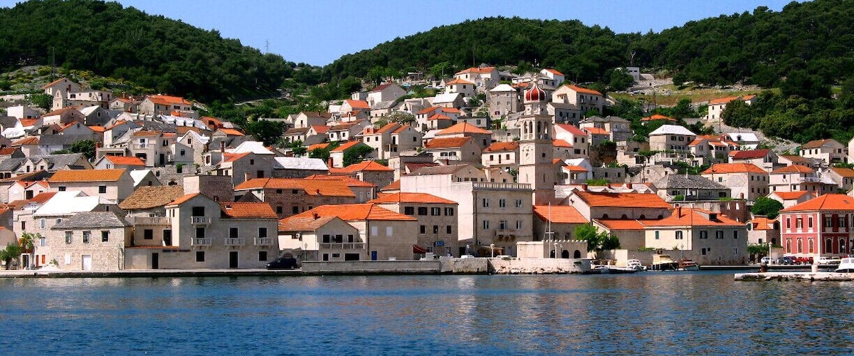 The town with a Crown!  This fairy-tale town is on the Island of Brac.  It's known for its limestone, which was used for the town's buildings and the White House in the U.S.  You can  visit the limestone carving school in town or relax with a beverage at an idyllic seaside spot.