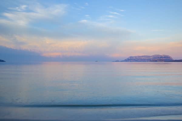 Pittulongu welches beinhaltet Strand und Sonnenuntergang