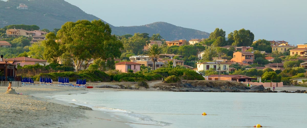 Pittulongu Beach which includes a sandy beach and a coastal town