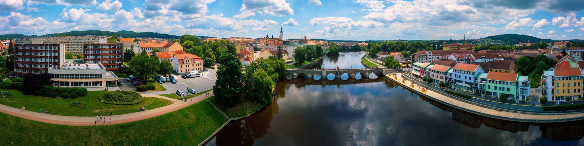 Medieval Town Pisek and historic stone bridge over river Otava in the Southern Bohemia, Czech Republic. Pisek Stone Bridge, the oldest preserved early Gothic bridge in the Czech republic.