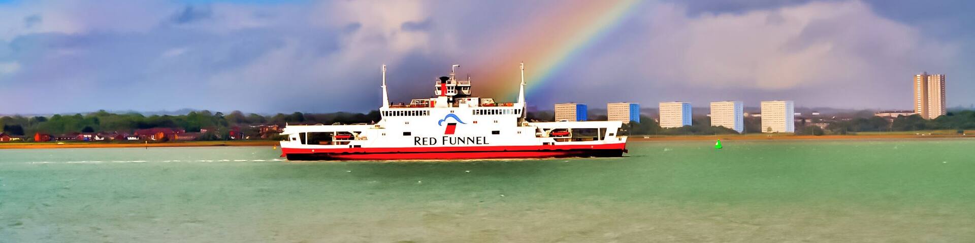 Red Funnel ferry sailing up Southampton water passing Weston Shore and through a rainbow.