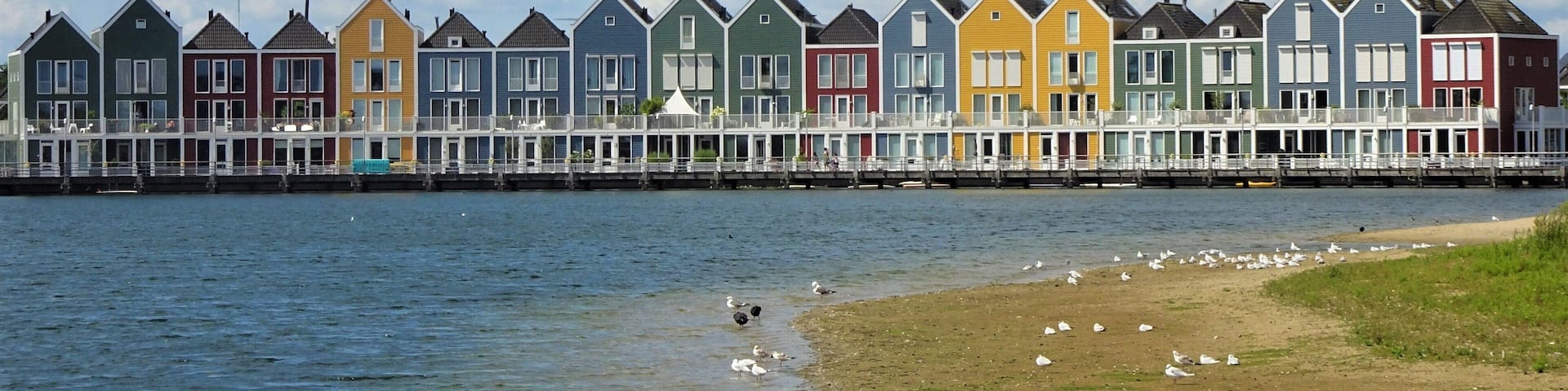 These colourful houses were designed by the Dutch architect Hans Been in 2005. His project was inspired by the colours of Willemstad (Curaçao) and the fishermen's houses of Marken (the Netherlands). #Architecture #LocalSecrets #Trovember
