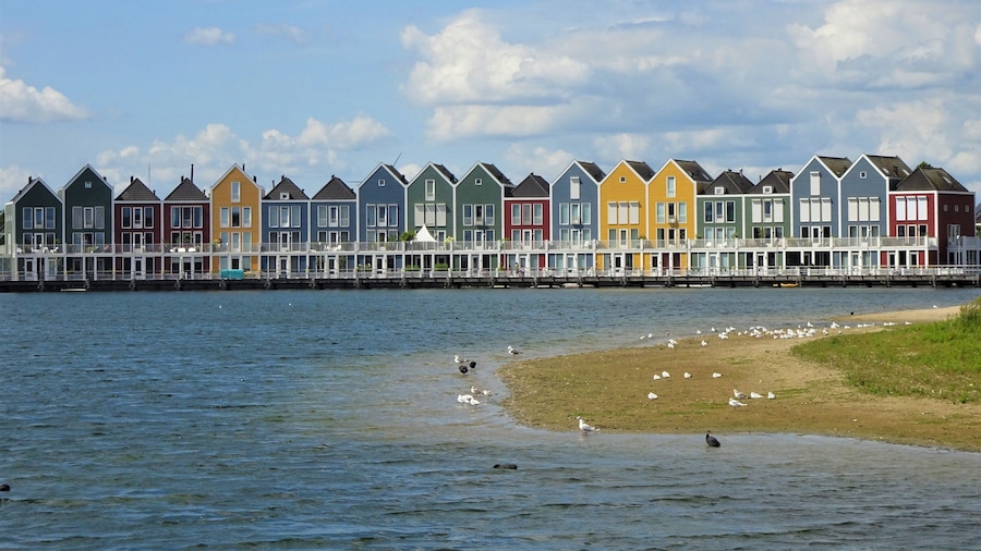 These colourful houses were designed by the Dutch architect Hans Been in 2005. His project was inspired by the colours of Willemstad (Curaçao) and the fishermen's houses of Marken (the Netherlands).  #Architecture  #LocalSecrets  #Trovember