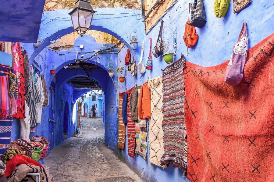 Medina - Chefchaouen, Morocco
It is known for the blue washed walls and doorways in the old city. Narrow alleys, cobbled walkways, stairs up and down, leading in all directions.
Chefchaouen's powder blue buildings mirror the cloudless Moroccan sky - but religious rather than stylistic reasons are behind the design choice. Jewish teachings suggest that by dyeing thread with tekhelel (an ancient natural dye) and weaving it into prayer shawls, people would be reminded of God's power. The tradition lives on in the regularly repainted blue buildings.
The walls are adorned with carpets, purses, blankets, paintings and much more. It was quite an adventure to get lost in the tiny lanes and alleys and discover the many berber shops and products.
#FindingtheUniverse
