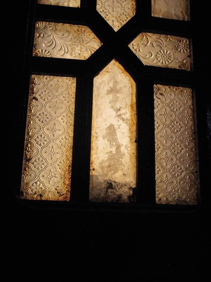 This patterned glass is used everywhere in Morocco - in doors, windows, lanterns...
This piece is in a door of the manor house in the Qasaba.  The fortress dates to 1471 . 
 The manor house is the home to the Ethnographic Museum of traditional Moroccan craft.
https://davenotravels.blog
