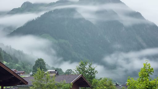 Low morning clouds and haze floating in the valleys of the mountains around Fusch an der Grossglocknerstrasse
