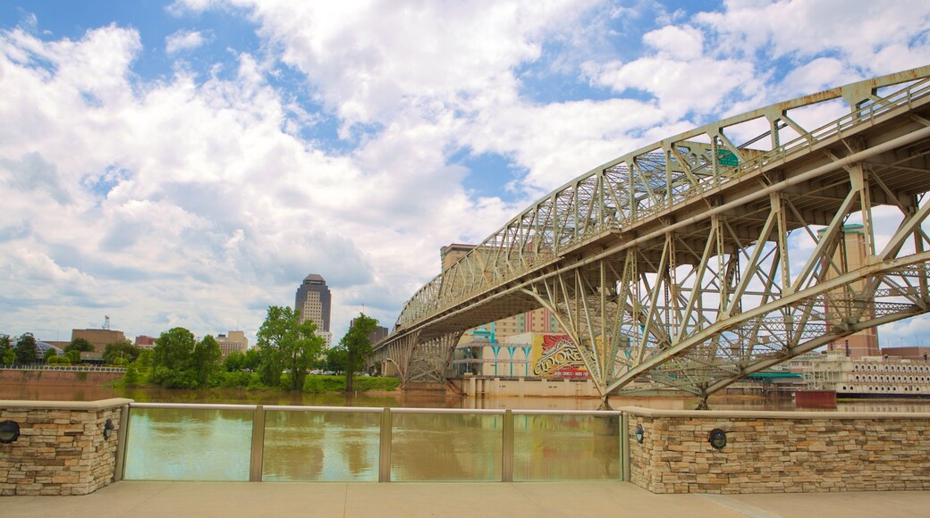 Louisiana Boardwalk which includes a bridge and a river or creek