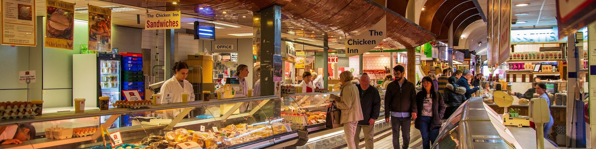 English Market showing interior views and markets as well as a small group of people