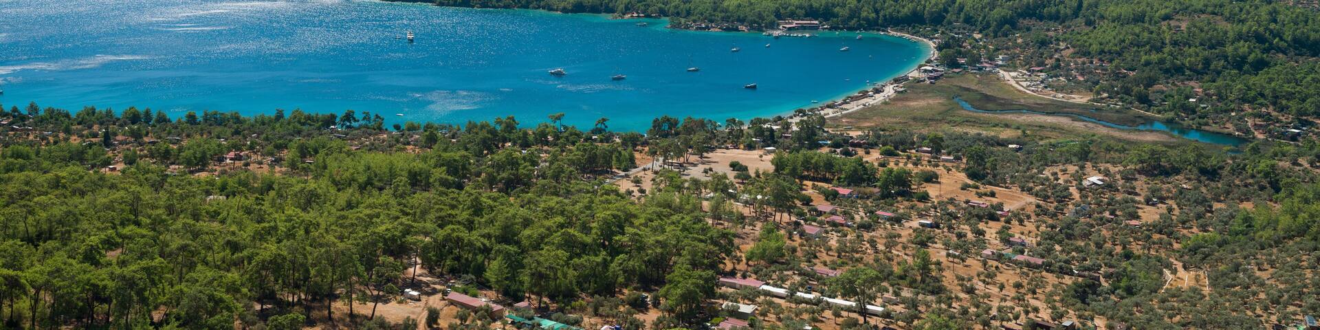Panoramic top view of Akbuk beach in the gulf of Gokova. The coasts of the Aegean Sea. Turkey's tourist attractions and beaches. Idyllic summer season background.Mugla province, Turkey