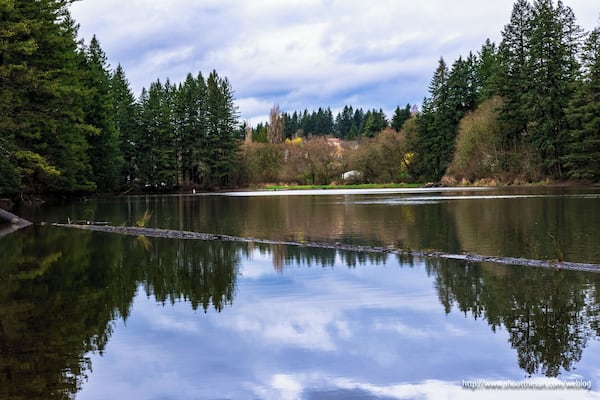 The lake itself is essentially a reservoir, built behind a dam constructed in the late 19th century to power the local pulp mill. The dam is just a beautiful antique now, and the reservoir "reserves" the water for little more than recreation.