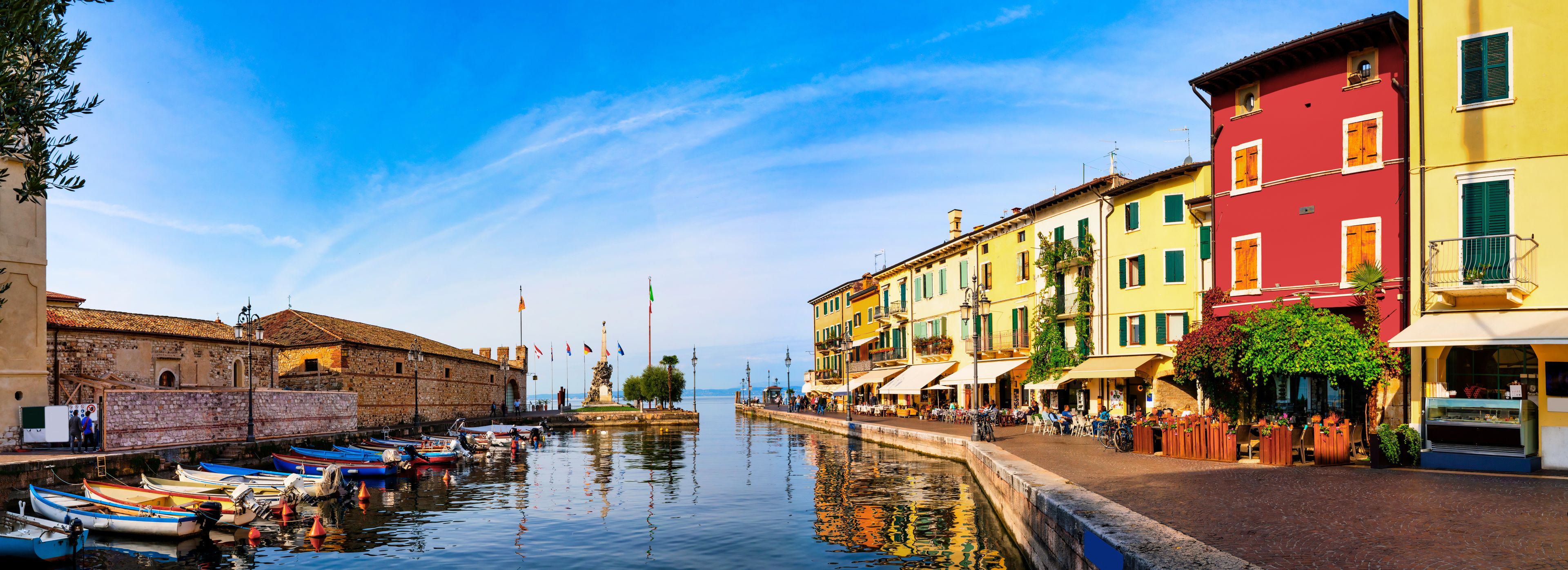 Lazise, Italy, 10/25/2019 : View of Lazise at the lakeside of Lake Garda in summer in the northern Italy. Lazise is a popular holiday location in Italy.