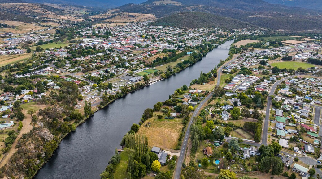 High angle aerial drone view of River Derwent, one of the major rivers on the island of Tasmania, Australia, near the town of New Norfolk, 30 kilometres from Tasmanias Capital City Hobart.