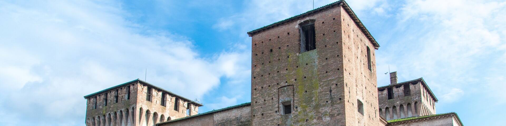 Castello di San Giorgio under the sunlight and a cloudy sky in Mantua in Italy