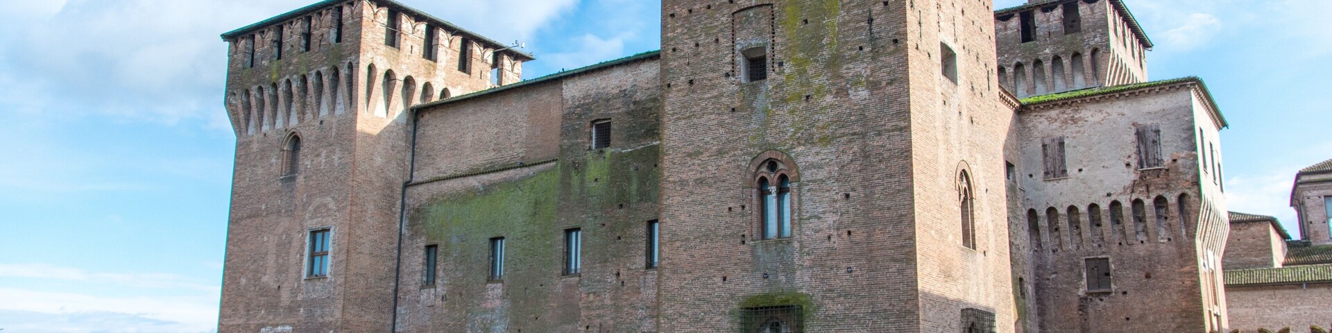 Castello di San Giorgio under the sunlight and a cloudy sky in Mantua in Italy