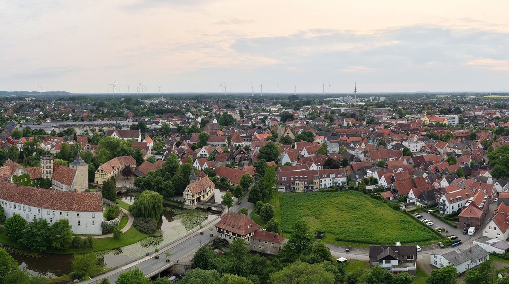 A panoramic drone view of the city and the castle, which sits on the water, in Steinfurt, Germany (Wasserschloss Burgsteinfurt)