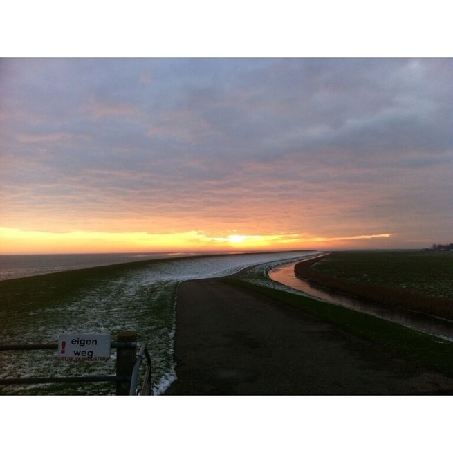 Sunset on the winterish island of Ameland, one of the 5 Waddeneilanden.