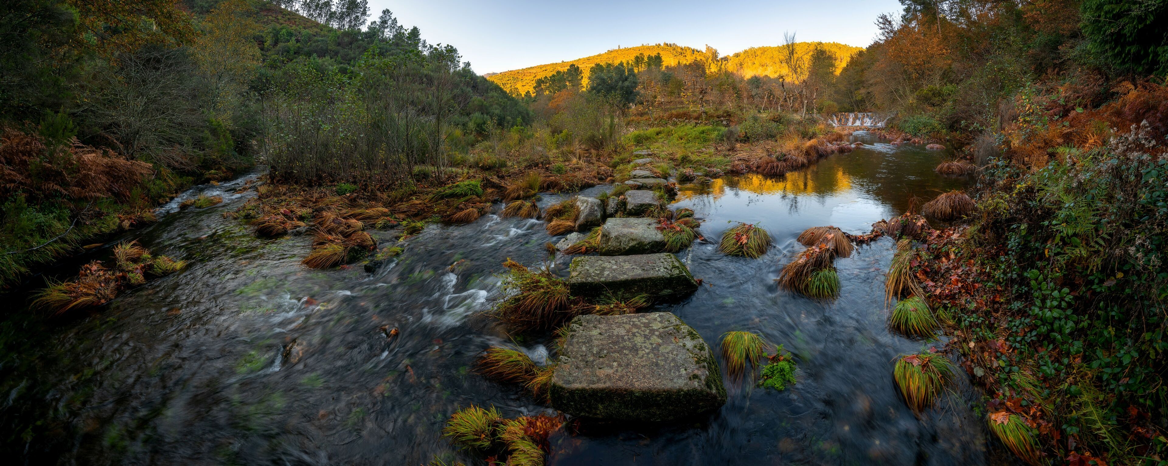 Mestres weir of Piscaredo hiking path on an autumn fall landscape