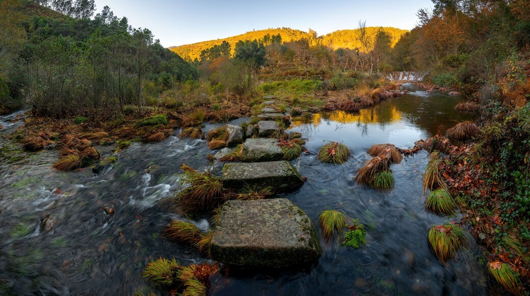 Mestres weir of Piscaredo hiking path on an autumn fall landscape