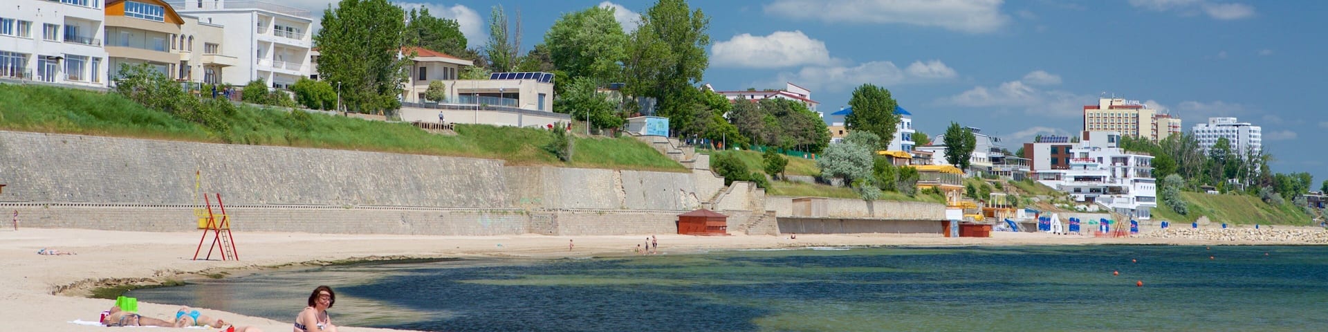 Eforie showing a beach and a coastal town