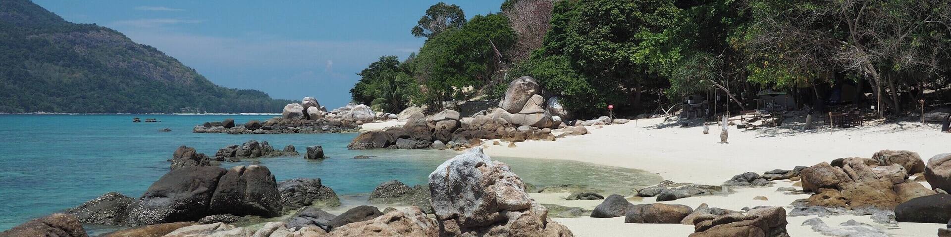 Much of Ko Lipe has now been given over to increasing mass tourism. On the west side of the island, however, you can still find gorgeous little coves which you can have to yourself. Just follow the concrete road past Sunset Beach westwards.
Read more at
http://www.aboveusonlyskies.com/koh-lipe-still-an-idyllic-island/