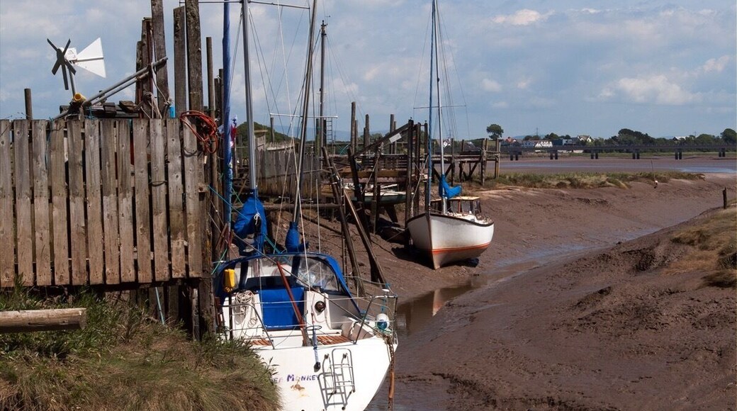 Boats moored at low tide