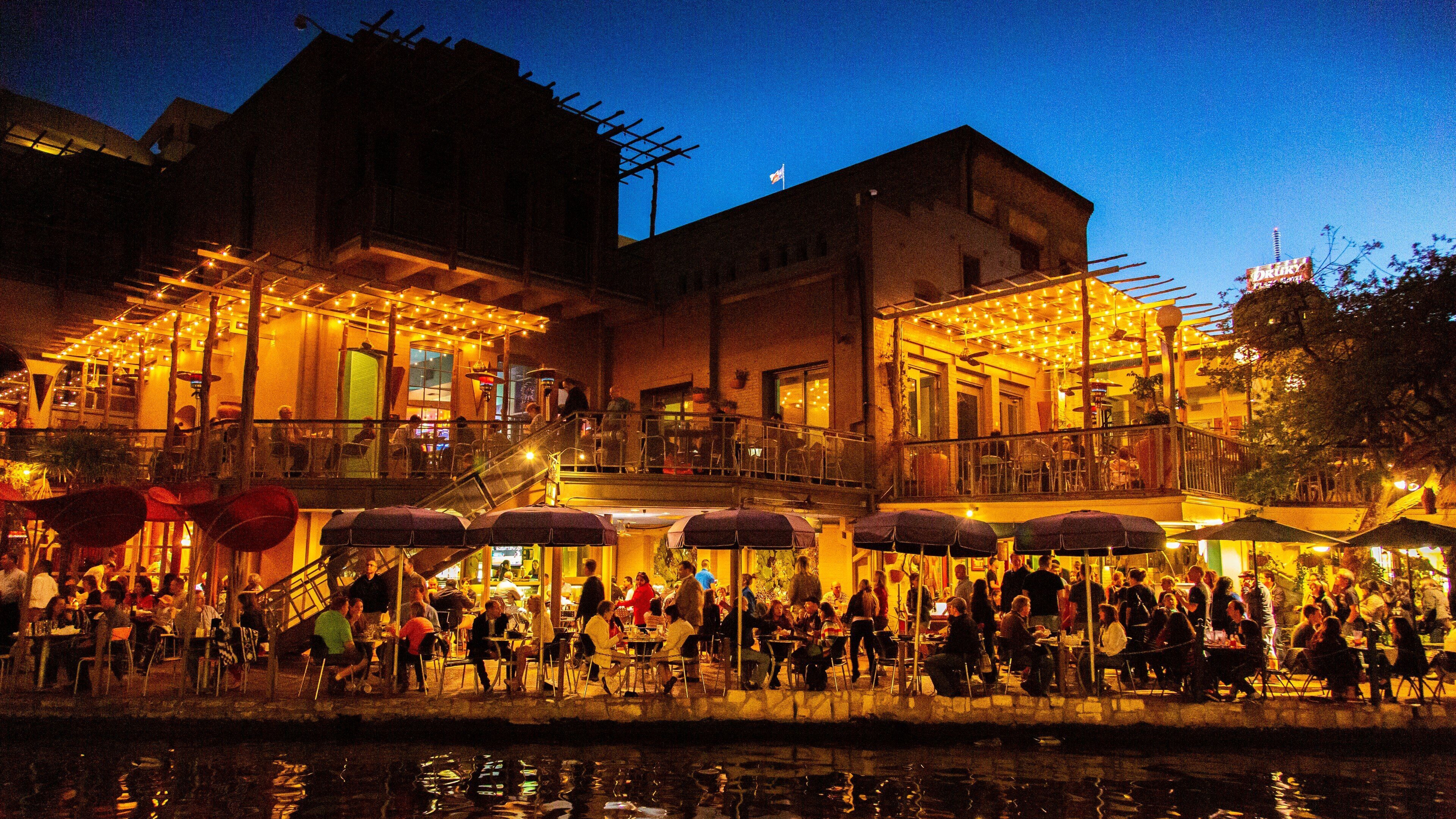 River Walk which includes night scenes, outdoor eating and street scenes