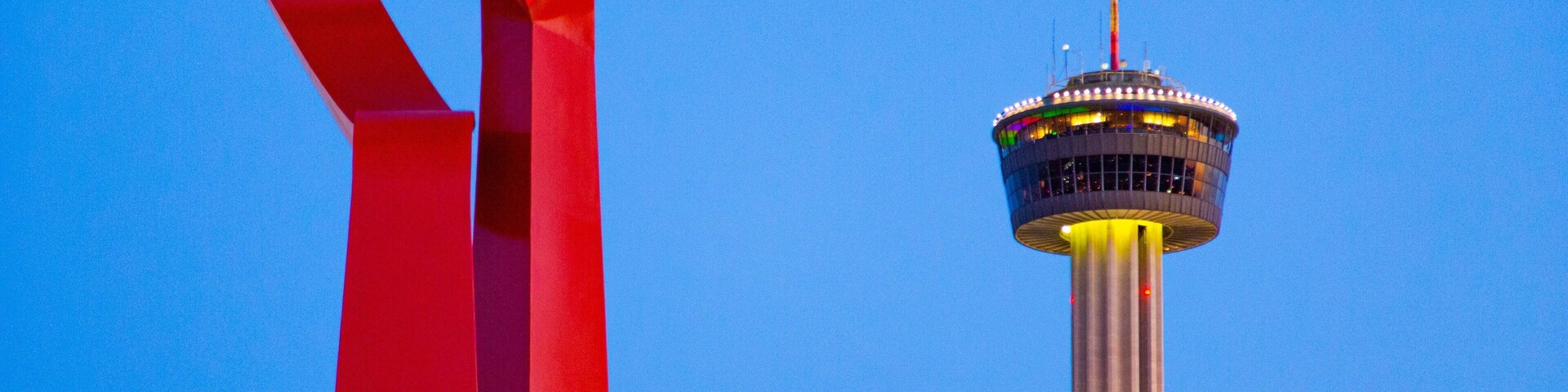 Downtown - Riverwalk which includes a skyscraper and modern architecture