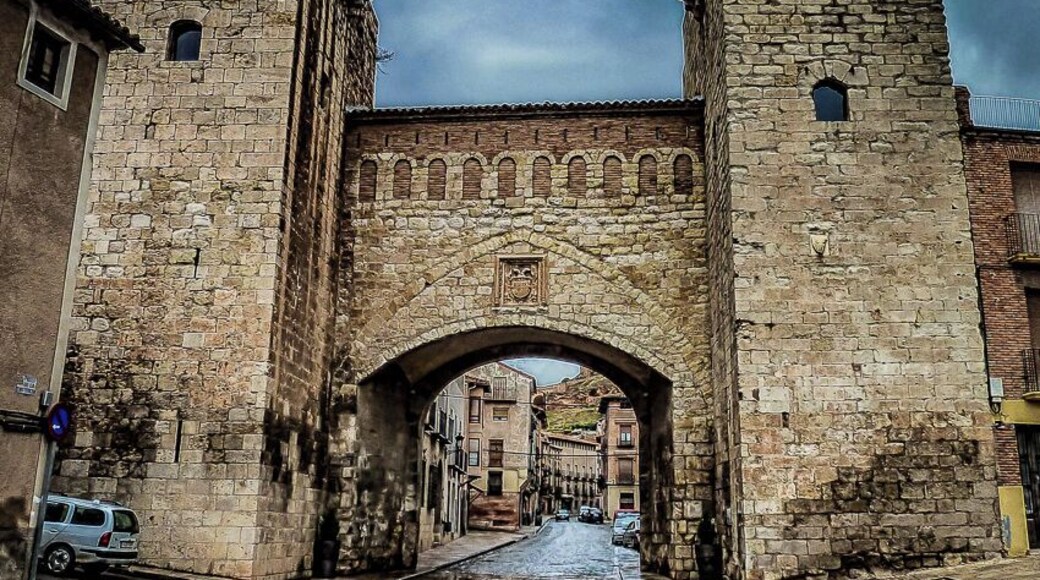 Daroca is a city in the province of Zaragoza. It's a fortified complex surrounded by walls built between the thirteenth and sixteenth century and preserved almost in its entirety. Stands out two defensive doors at the two main entrances to the city. The Puerta Baja (Picture here), remodeled in the sixteenth century with two square towers, and the Puerta Alta, transformed in the seventeenth century.