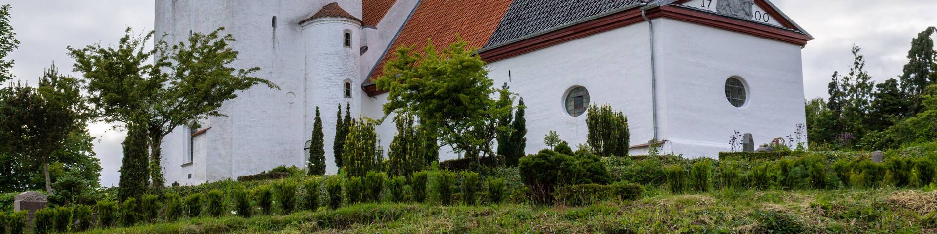 Nordborg Church with tower and Garden. In Sonderborg, Island Als, South Denmark.