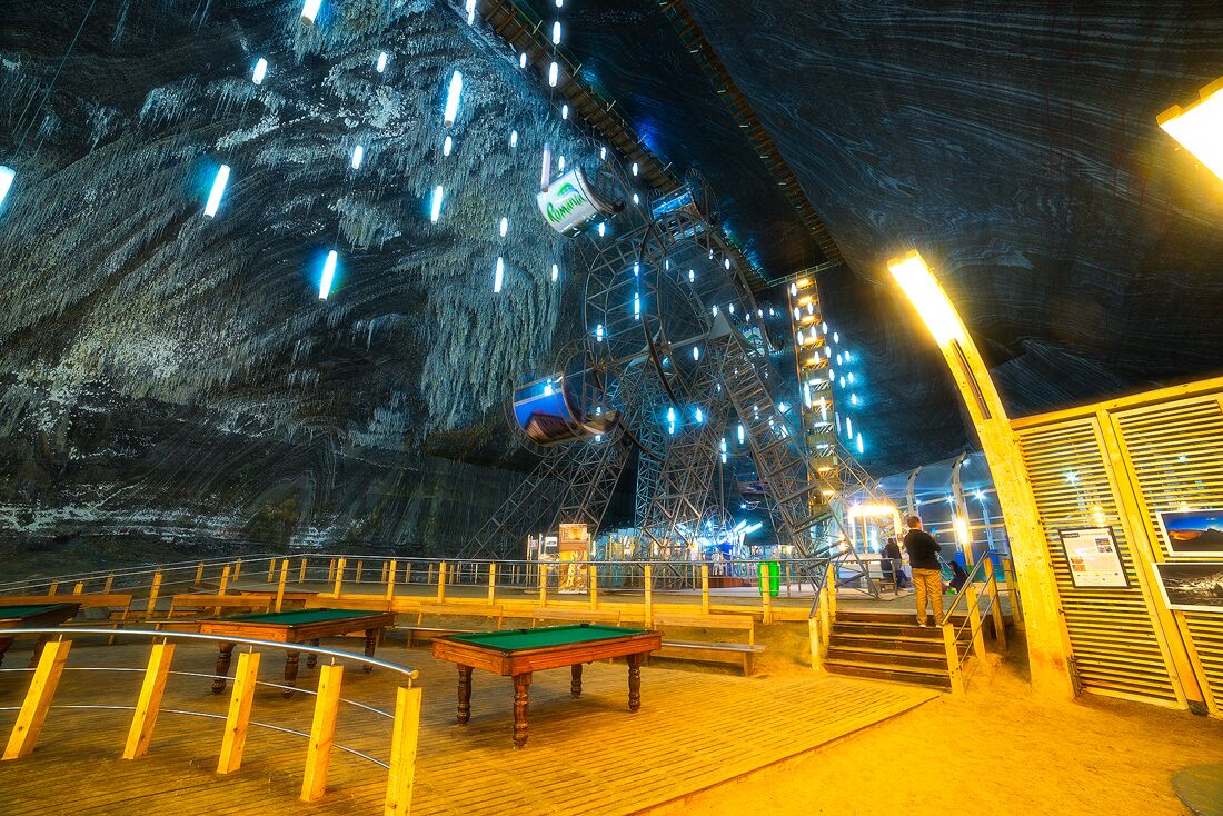 A Ferris wheel and pool tables are part of the underground theme park's attraction.

http://www.alwayswanderlust.com/deep-underground-in-transylvanias-subterranean-theme-park-salina-turda/