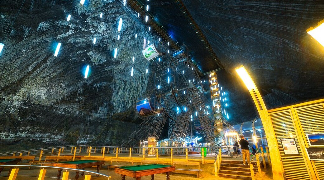 A Ferris wheel and pool tables are part of the underground theme park's attraction.
http://www.alwayswanderlust.com/deep-underground-in-transylvanias-subterranean-theme-park-salina-turda/