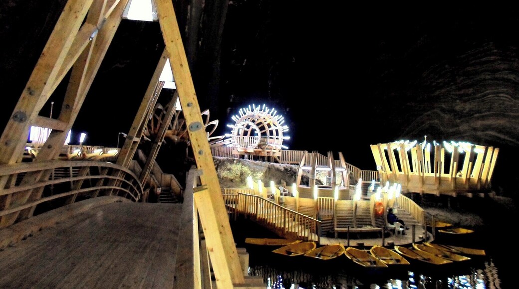 Inside the Turda salt mine. 15 Km of underground tunnels and caves! Theresa Mine is the largest one and at the bottom there's a big lake that you can explore by renting one of the boats. Cool place, futuristic setting, there's even a ferris-wheel!
More:
https://worldlings.wordpress.com/2016/05/11/transylvania-turda/
