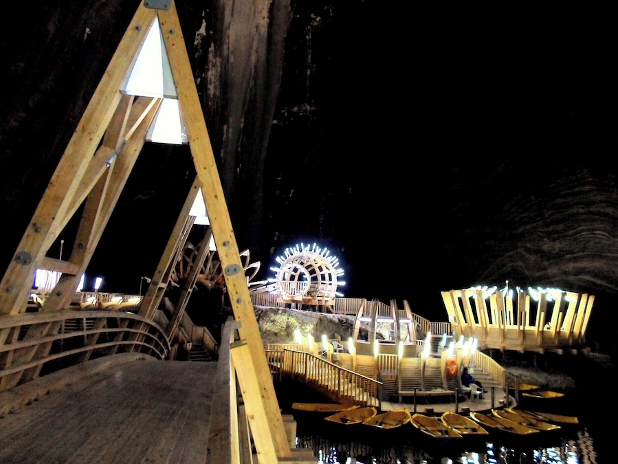 Inside the Turda salt mine. 15 Km of underground tunnels and caves! Theresa Mine is the largest one and at the bottom there's a big lake that you can explore by renting one of the boats. Cool place, futuristic setting, there's even a ferris-wheel!
More:
https://worldlings.wordpress.com/2016/05/11/transylvania-turda/
