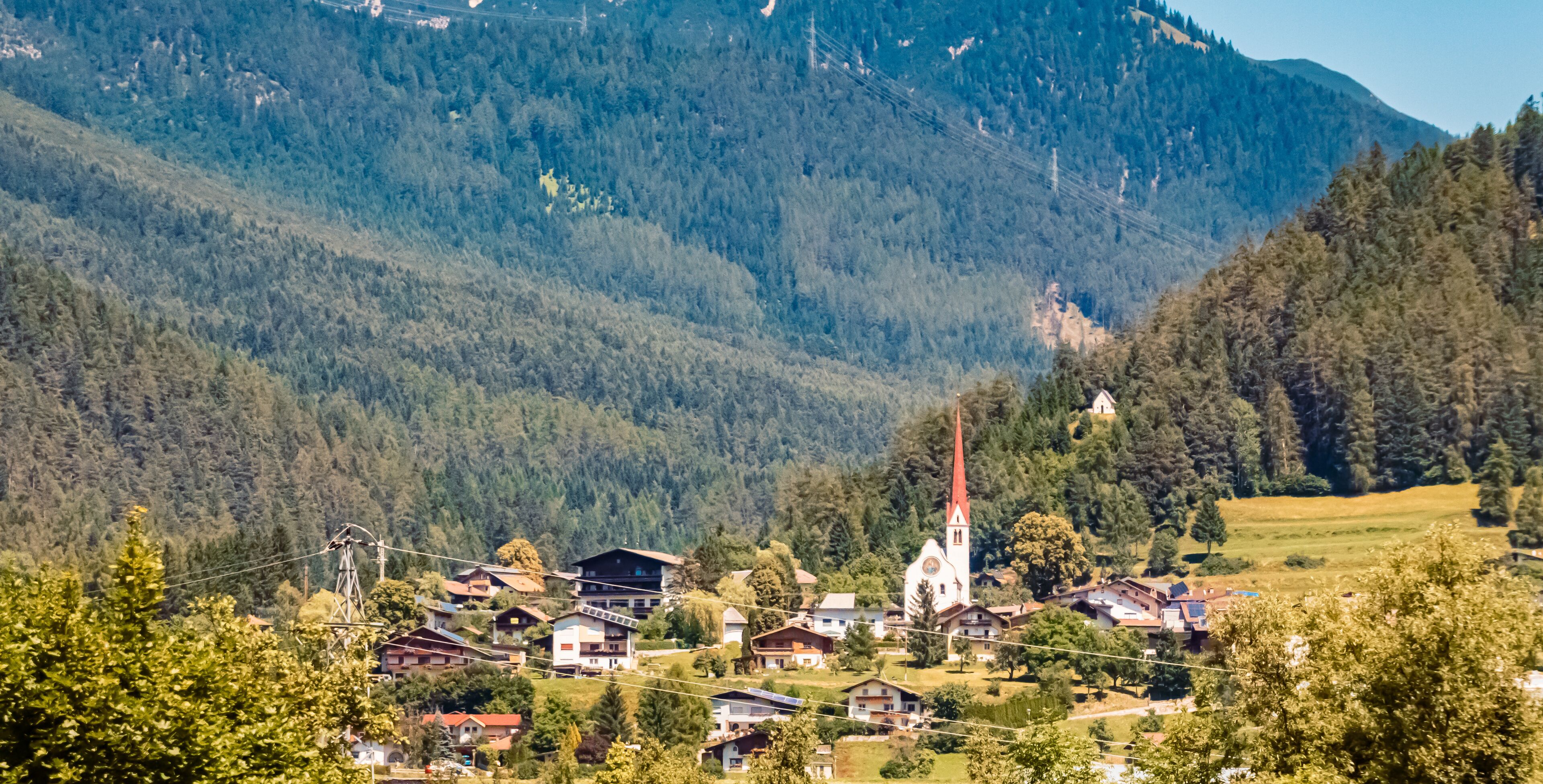 Alpine summer view with a church near Nassereith, Imst, Tyrol, Austria