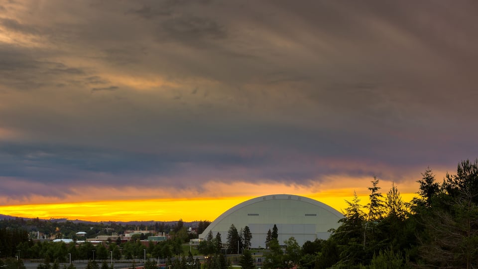 Dramatic sunrise over a football spors dome in Moscow Idaho