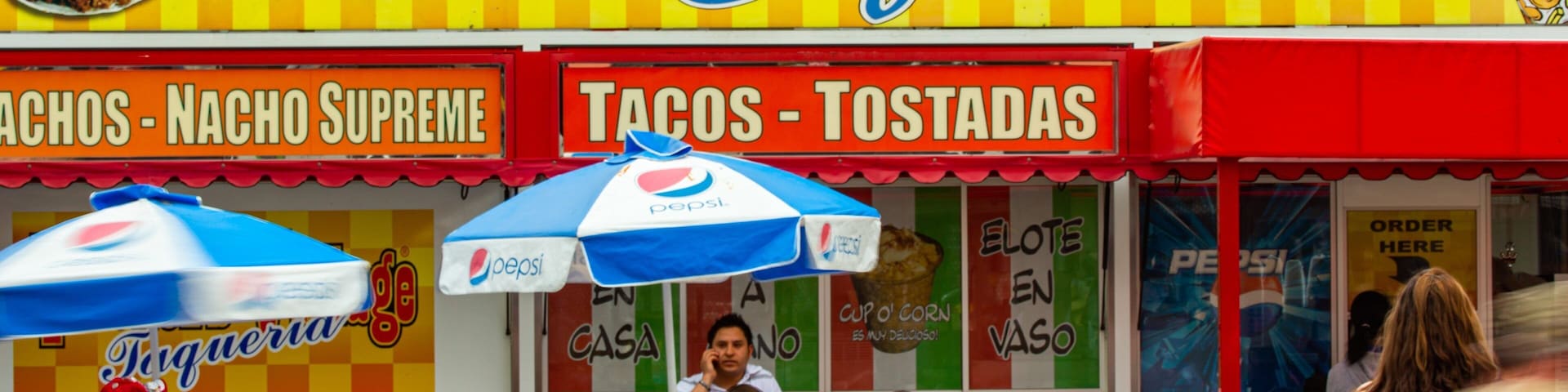 Traders Village showing signage as well as a family