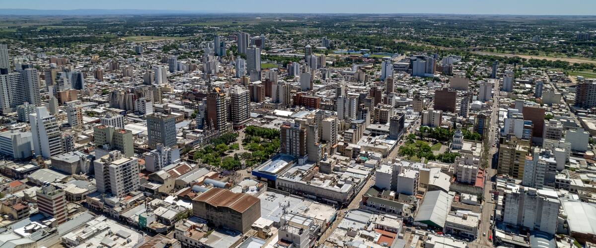 A densely built urban area with numerous high-rise buildings and a mix of older and modern architecture.