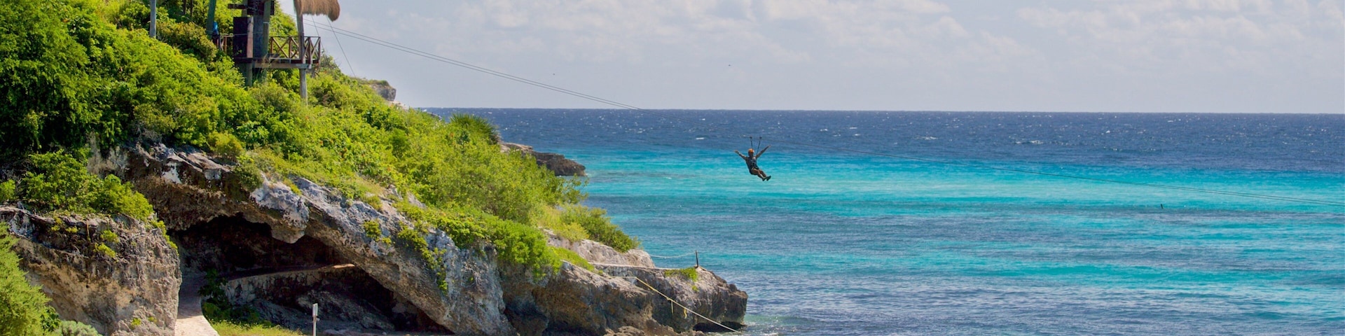 Isla Mujeres mostrando tirolesa, paisagens litorâneas e caiaque ou canoagem