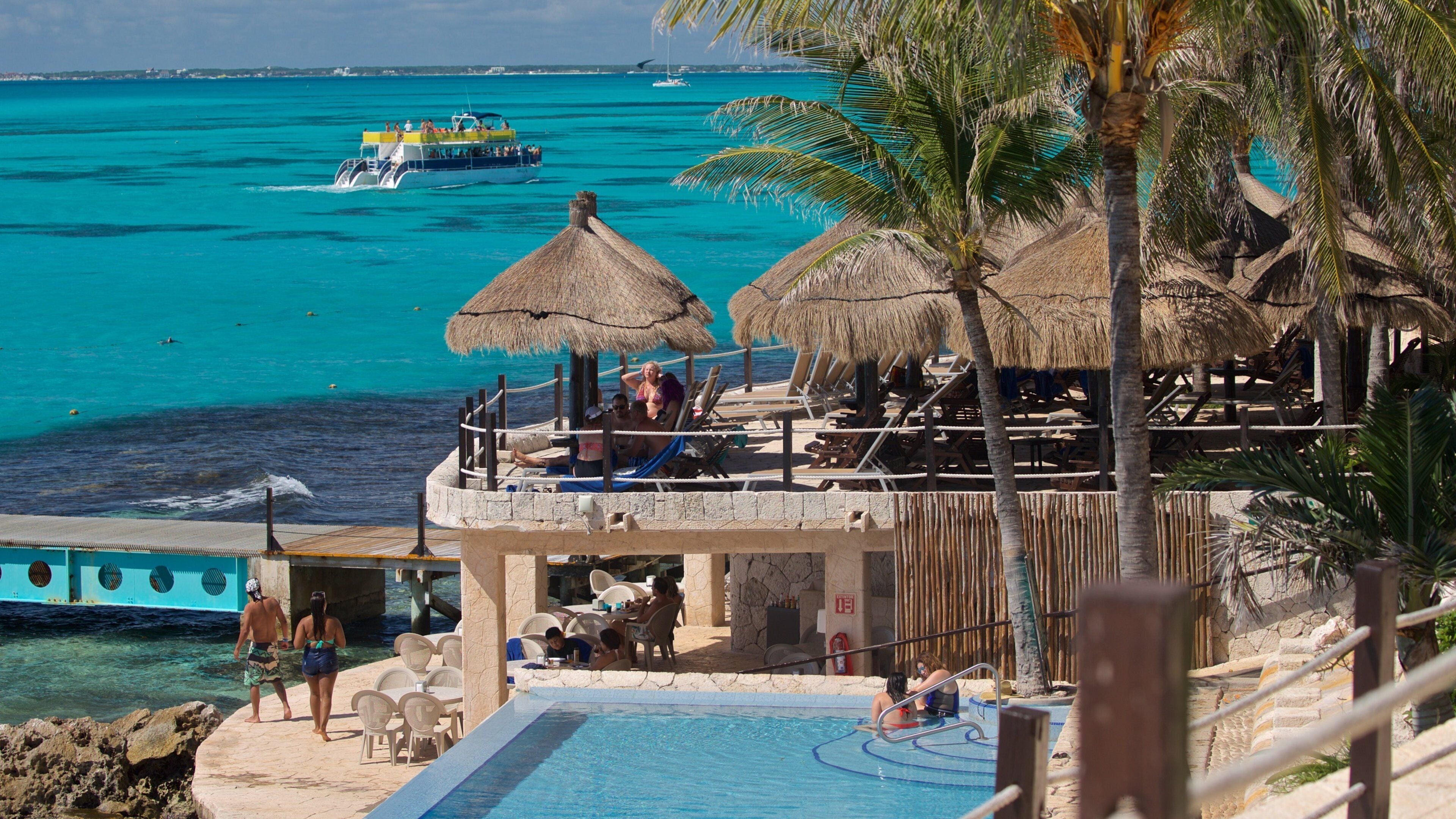 Isla Mujeres featuring a luxury hotel or resort, general coastal views and tropical scenes