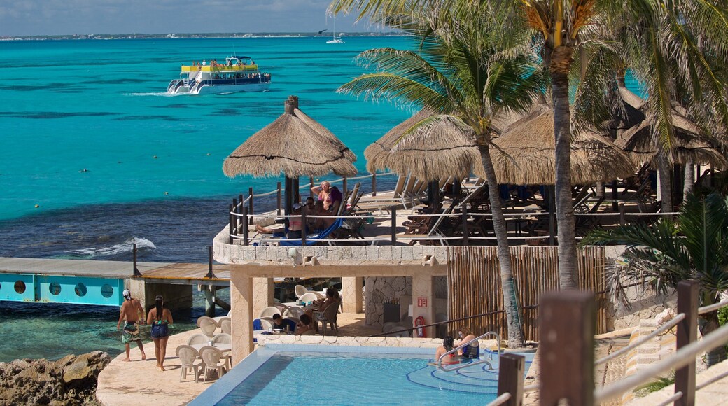 Isla Mujeres featuring a luxury hotel or resort, general coastal views and tropical scenes