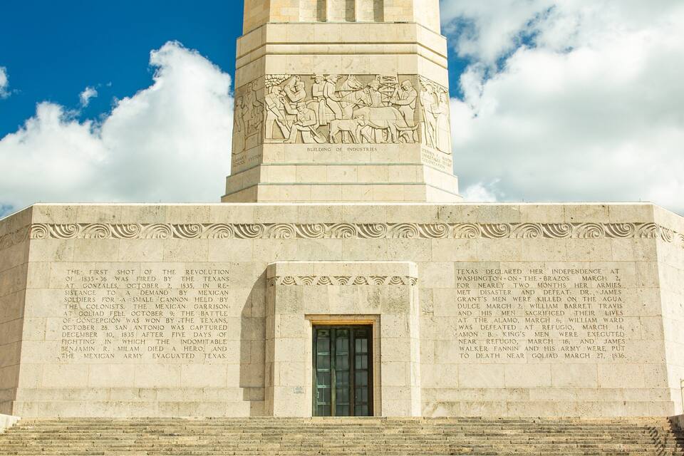 A historical monument with inscriptions detailing significant events.