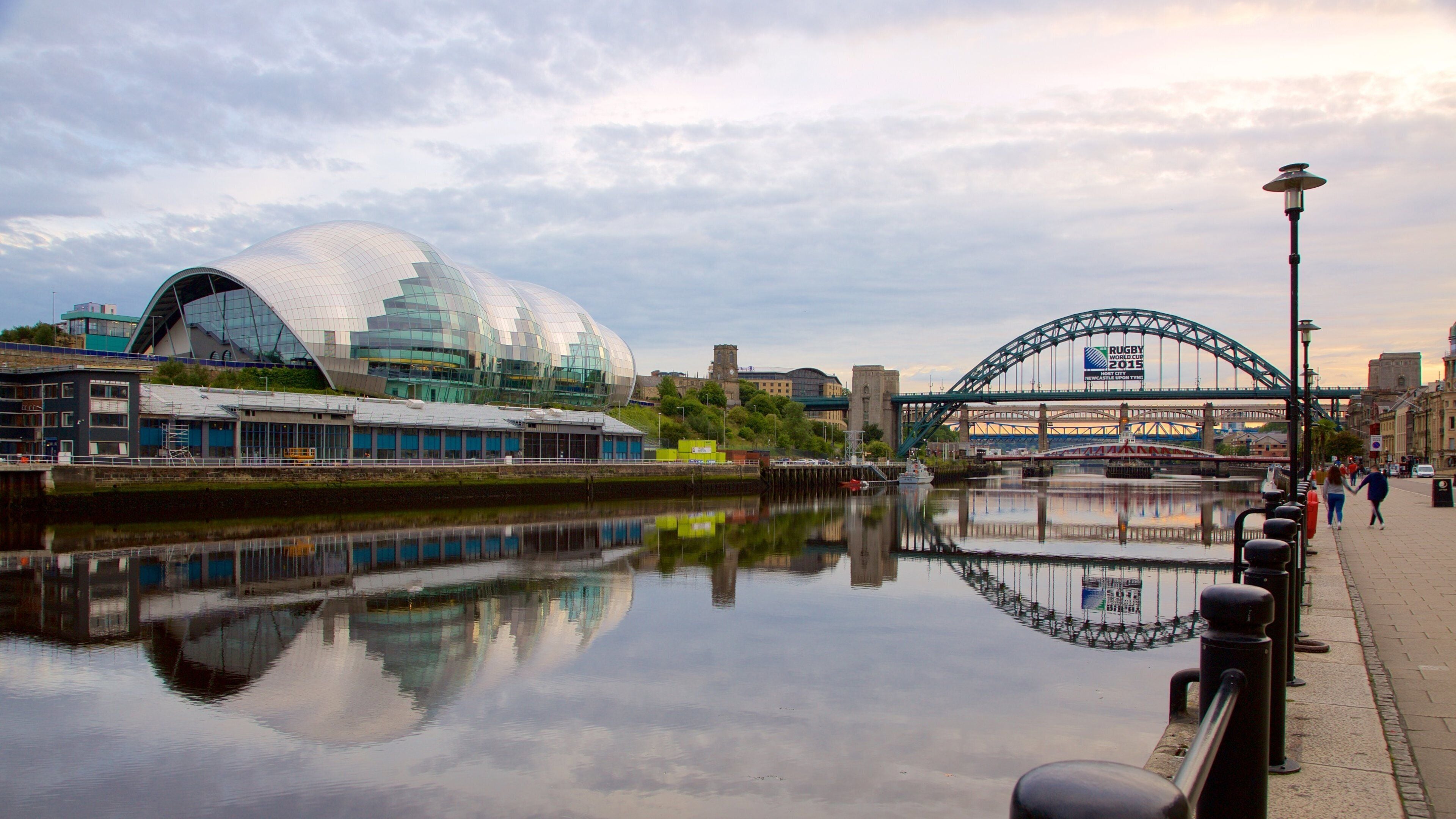 Quayside showing a river or creek, a bridge and modern architecture