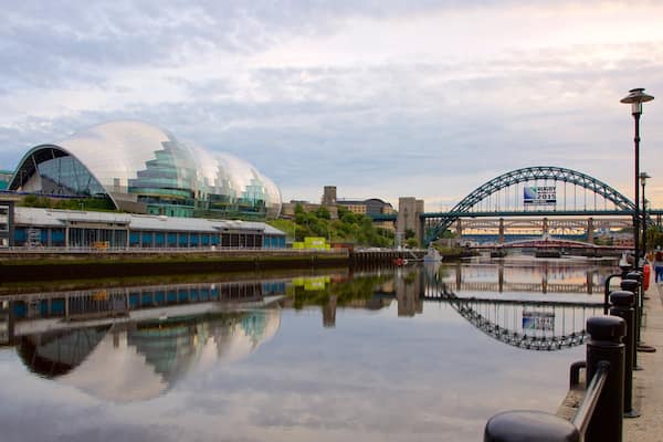 Quayside showing a river or creek, a bridge and modern architecture