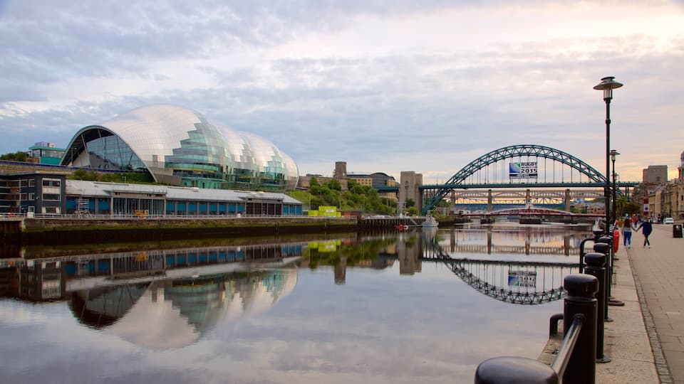 Quayside showing a river or creek, a bridge and modern architecture