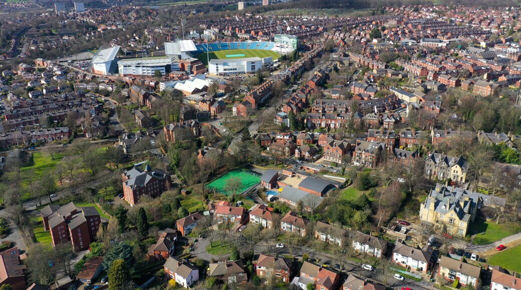 Aerial photo over looking the area of Leeds known as Headingley in West Yorkshire UK, showing a typical British hosing estates and roads taken with a drone on a sunny day