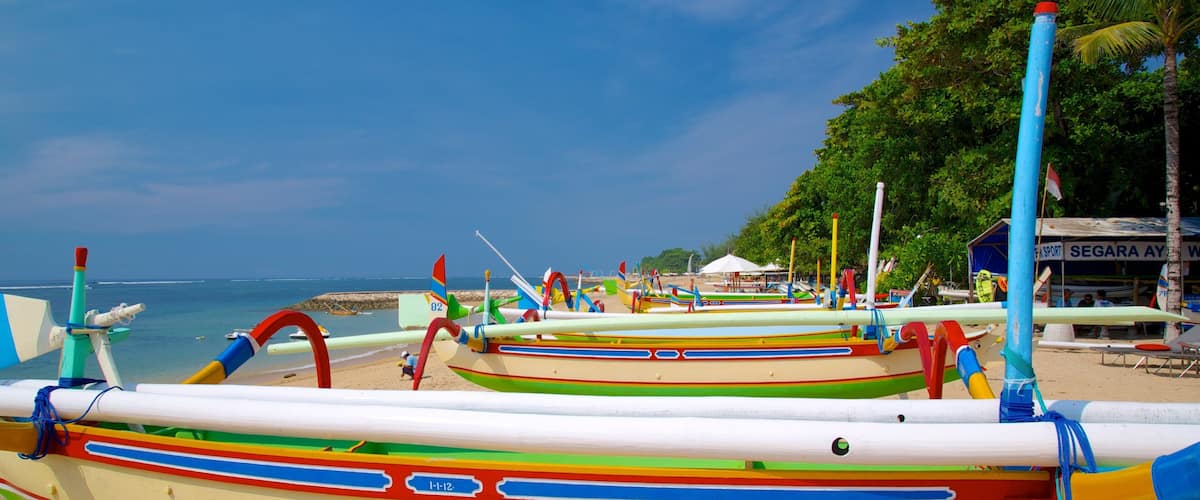 Segara Beach featuring tropical scenes, boating and a beach
